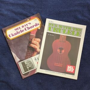 Two Mel Bay's Ukulele Instruction Guides.